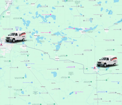 Map with two delivery vans labeled "Carrier" positioned on different highways in a light green and blue landscape with various cities and lakes marked.