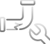 A wrench is positioned near a leaking pipe, indicating plumbing repair or maintenance.