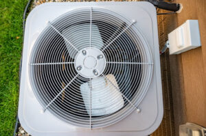 The fan on an outdoor central AC unit.