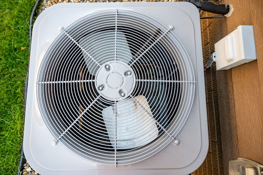 The fan on an outdoor central AC unit.
